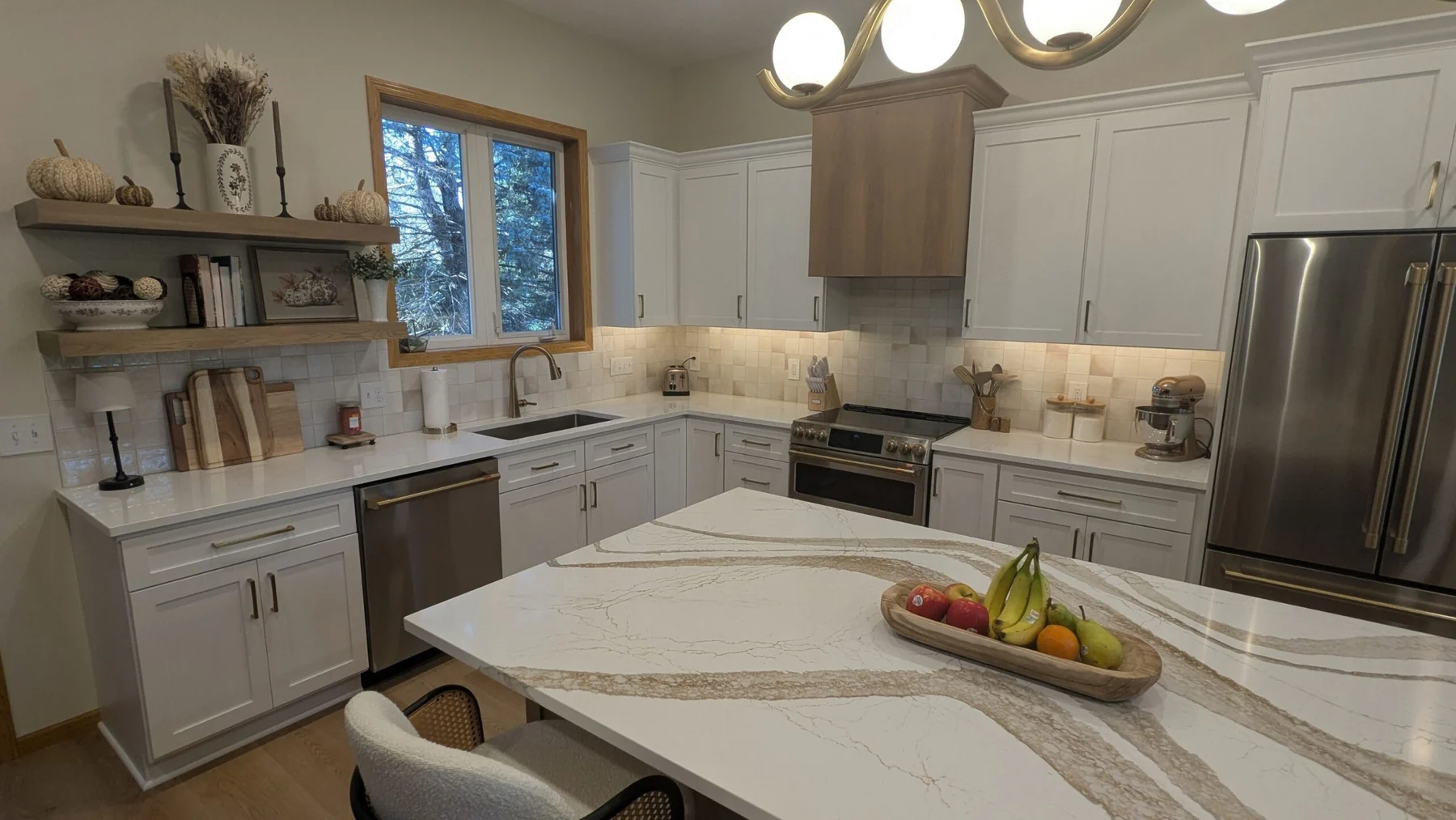 Kitchen with white cabinets and quartz countertops in Woodbury MN